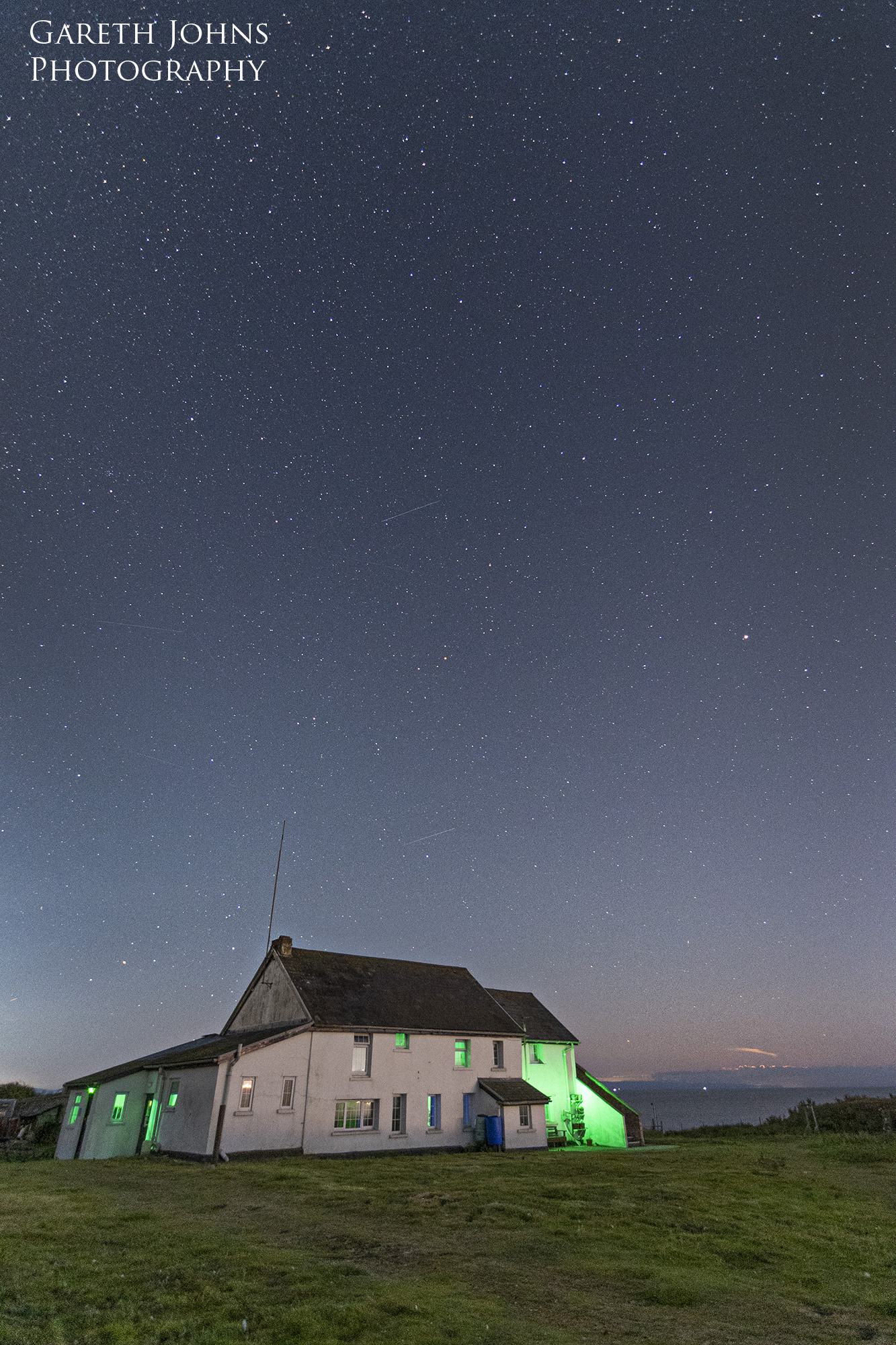 Flat Holm farm house under the night sky