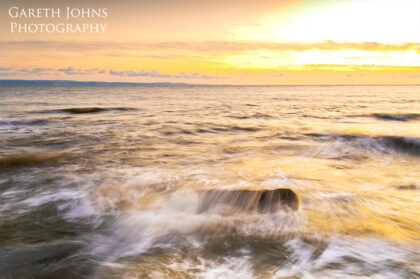 Incoming tide at sunset on Southerndown beach